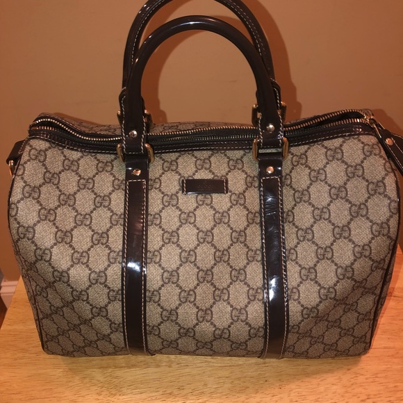 Gucci Handbags - Authentic Gucci canvas Leather Boston speedy bag